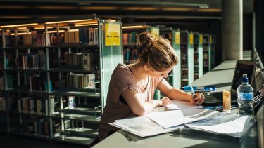 Student in library