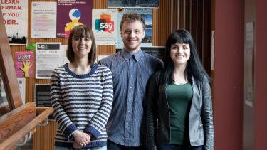 Group of three postgraduate history students