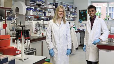 Biomedical Science postgraduates in lab: Caroline Telfer and Chandresh Jain