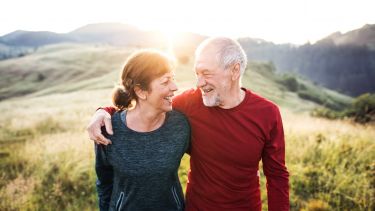 Happy couple in sunset