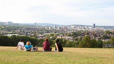 Students looking out over Sheffield from aerial view