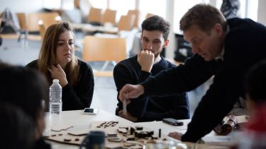 Postgraduate students working in a group