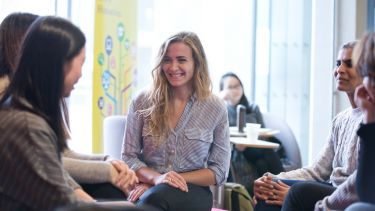 Postgraduate students smiling