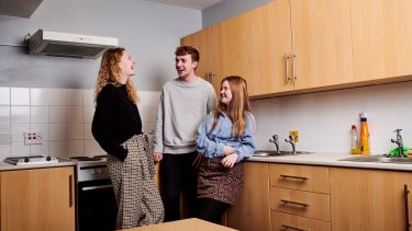 Endcliffe vale kitchen with students laughing