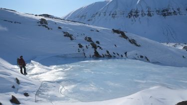 An iced over lake in the arctic