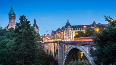 Adolphe bridge at twilight in Luxembourg City. Credit wichan yingyongsomsawas