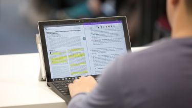 A student working on a laptop