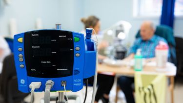 A patient being looked after by a Health Sciences student