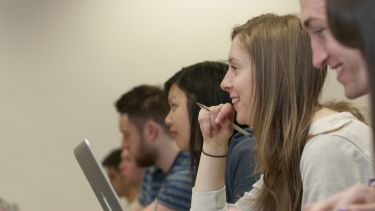 Students sat in row in lecture