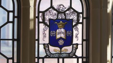 The University crest in stained glass