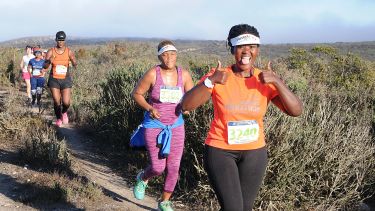 Alumna Sikose Mjali running the Langebaan Country Estate Weskus Marathon 