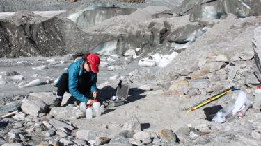 Student participating in fieldwork in glacial territory