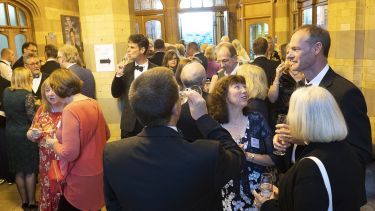Alumni at the drinks reception in Firth Court