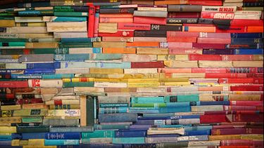 piles of colourful books