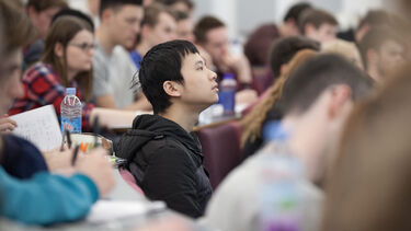 A student is listening to a lecture - image 