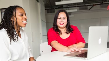 Two ladies having a discussion