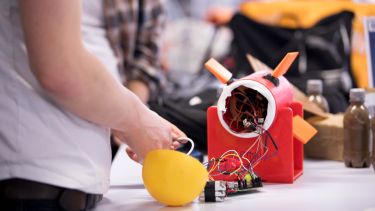 And image of a robot fish under construction