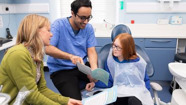 A young patient at the dentist.