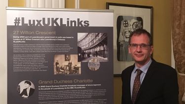 John Marshall with exhibition banner