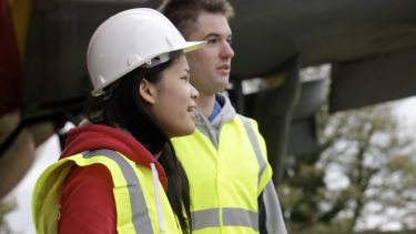 Engineers on site in hard hats