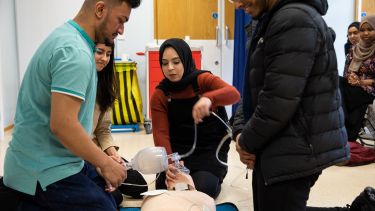 Medicine students undertaking CPR training