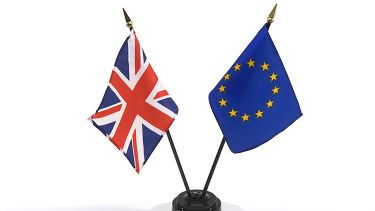 A Union Jack and EU flag side by side