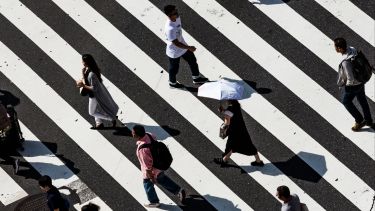 People walking on a zebra crossing