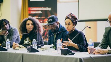 The panel at the youth symposium