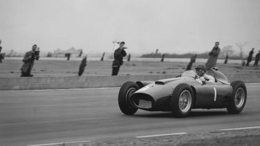 Juan Manuel Fangio driving an F1 car in 1956