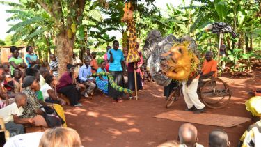 The play: featuring Snake, Giraffe, Elephant, Lion and Eagle in Works Village, Walukuba. Copyright Katie McQuaid 2016.