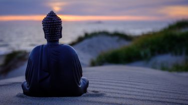 A Buddha statue on the beach