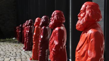 Red statues of Karl Marx