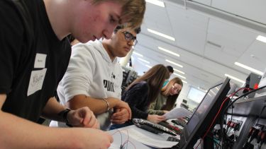 Photograph showing Y12 students on EEE Taster Day in Electronics lab