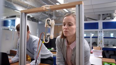 Dana working in the lab with soft robotics