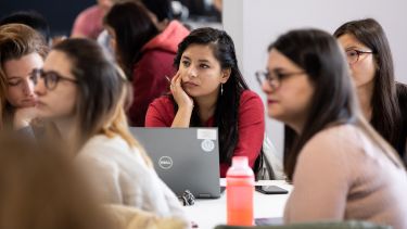A group of students in a School of Health and Related Research lecture.