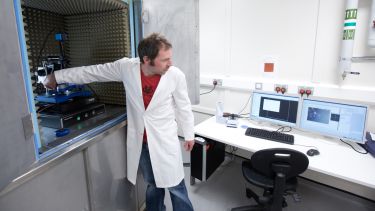 Dr Nic Mullin uses an atomic force microscope.