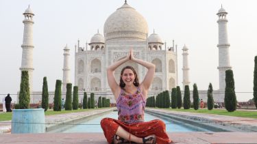 Maxine Cole in front of the Taj Mahal
