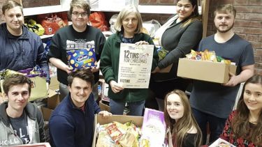 The North Current team with foodbank donations. 