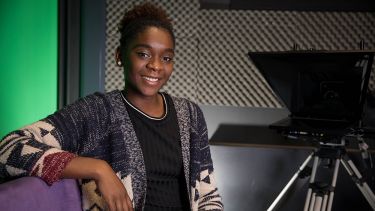A photo of Paula Ugochukwu in a recording studio - image