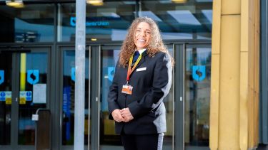 Member of the security staff stood outside the SU