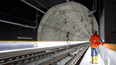 An engineer in a railway tunnel