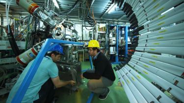 People working behind the scenes at the large hadron collider at CERN