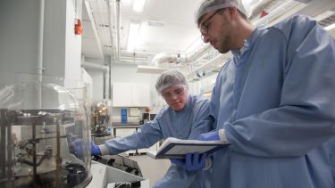 Researchers working in a materials laboratory