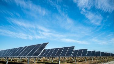 Solar panels under a blue sky