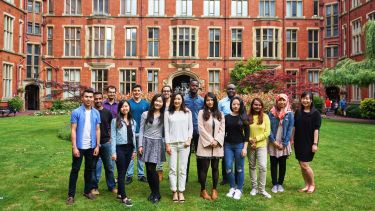 A group of International student ambassadors stand together in Firth Court