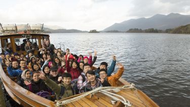 Students on a boat during Lake District trip
