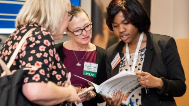Susan Fitzmaurice and Nicola Talbot talk to a guest at City Connections event