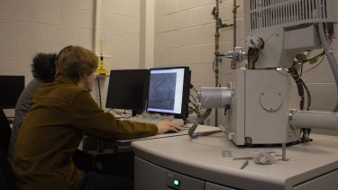 Researchers using an electron microscope in the Sorby Centre for Electron Microscopy