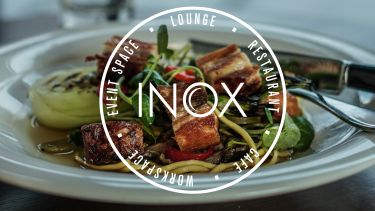 Inox Dine logo