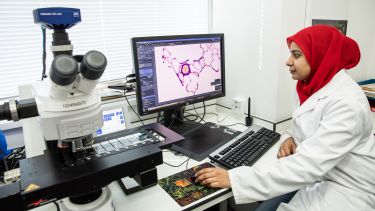 Student using computer equipment